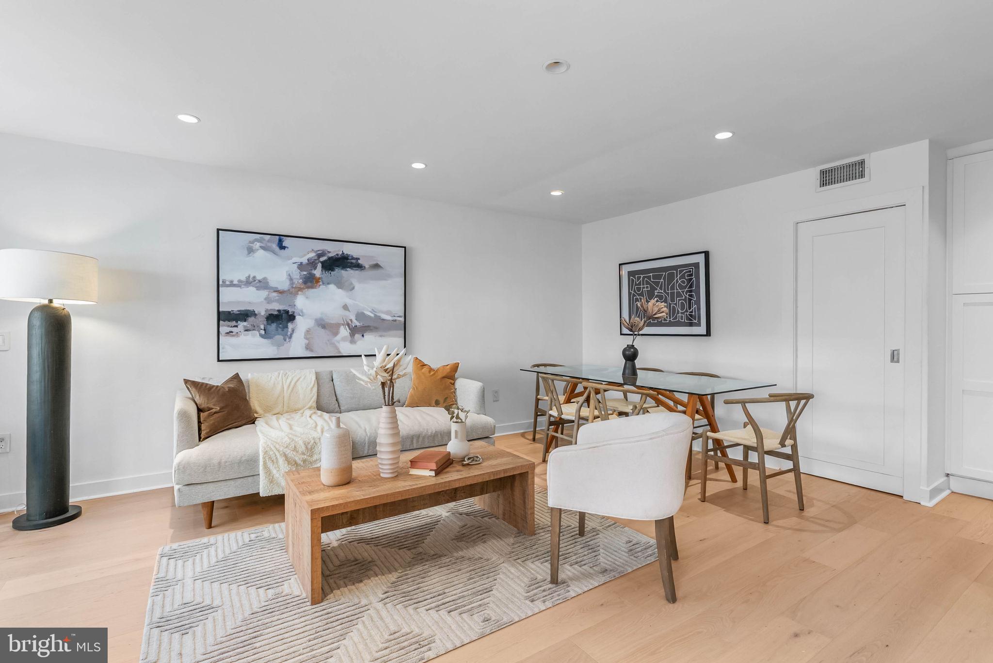 2018 Walnut Street, Unit 2018 Philadelphia, PA 19103 - Photo 6 of 52 a living room with furniture and a rug