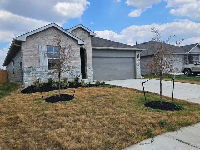 a house view with a outdoor space