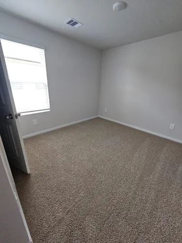 an empty room with a window