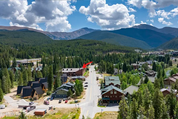 a view of a balcony with chairs