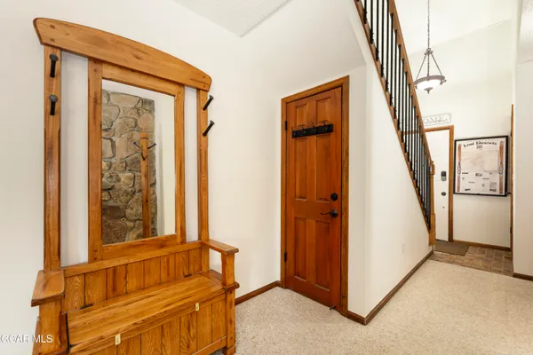 a view of front door with hallway