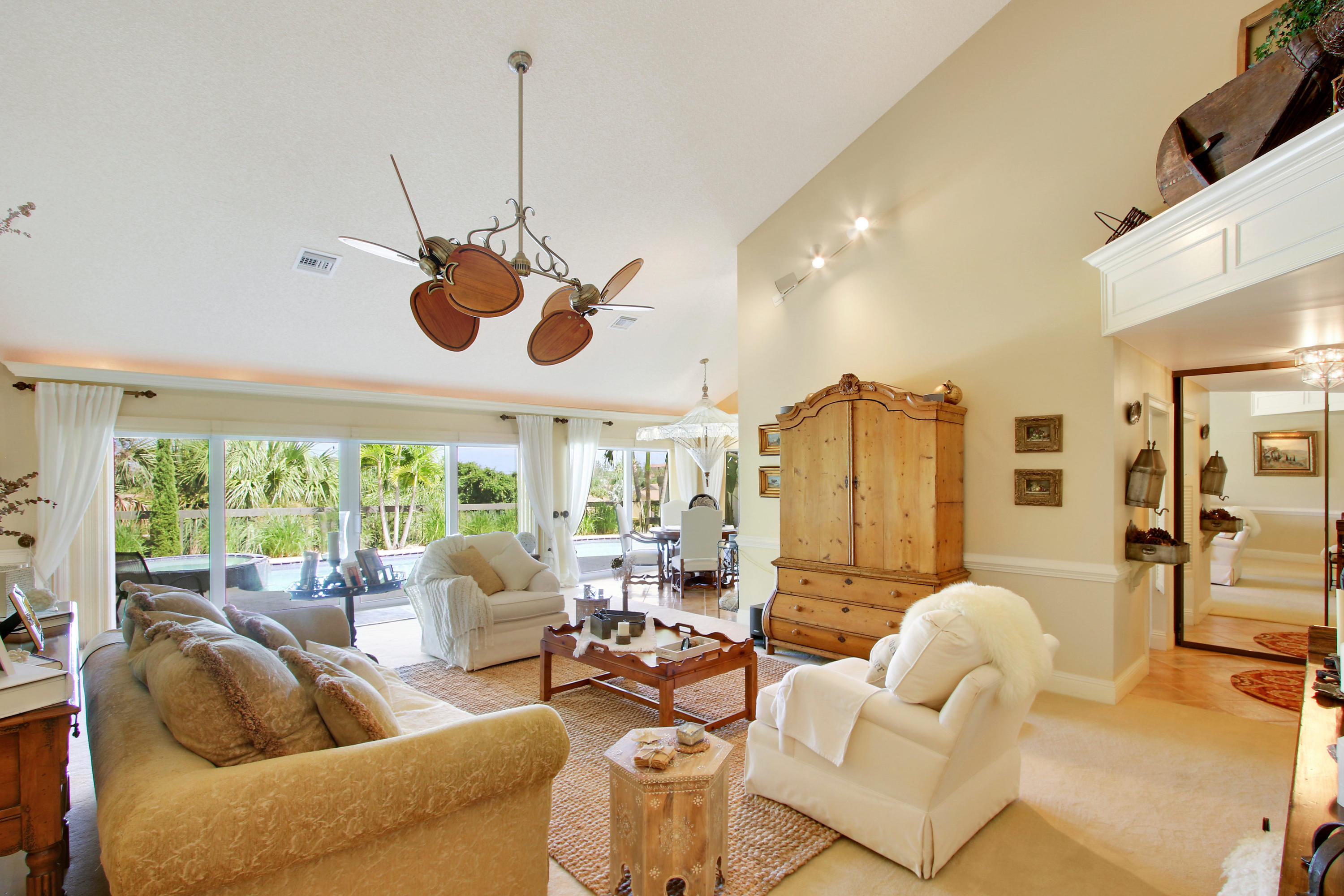 317 Ridge Road Jupiter, FL 33477 - Photo 14 of 33 Living Room overlooking Pool