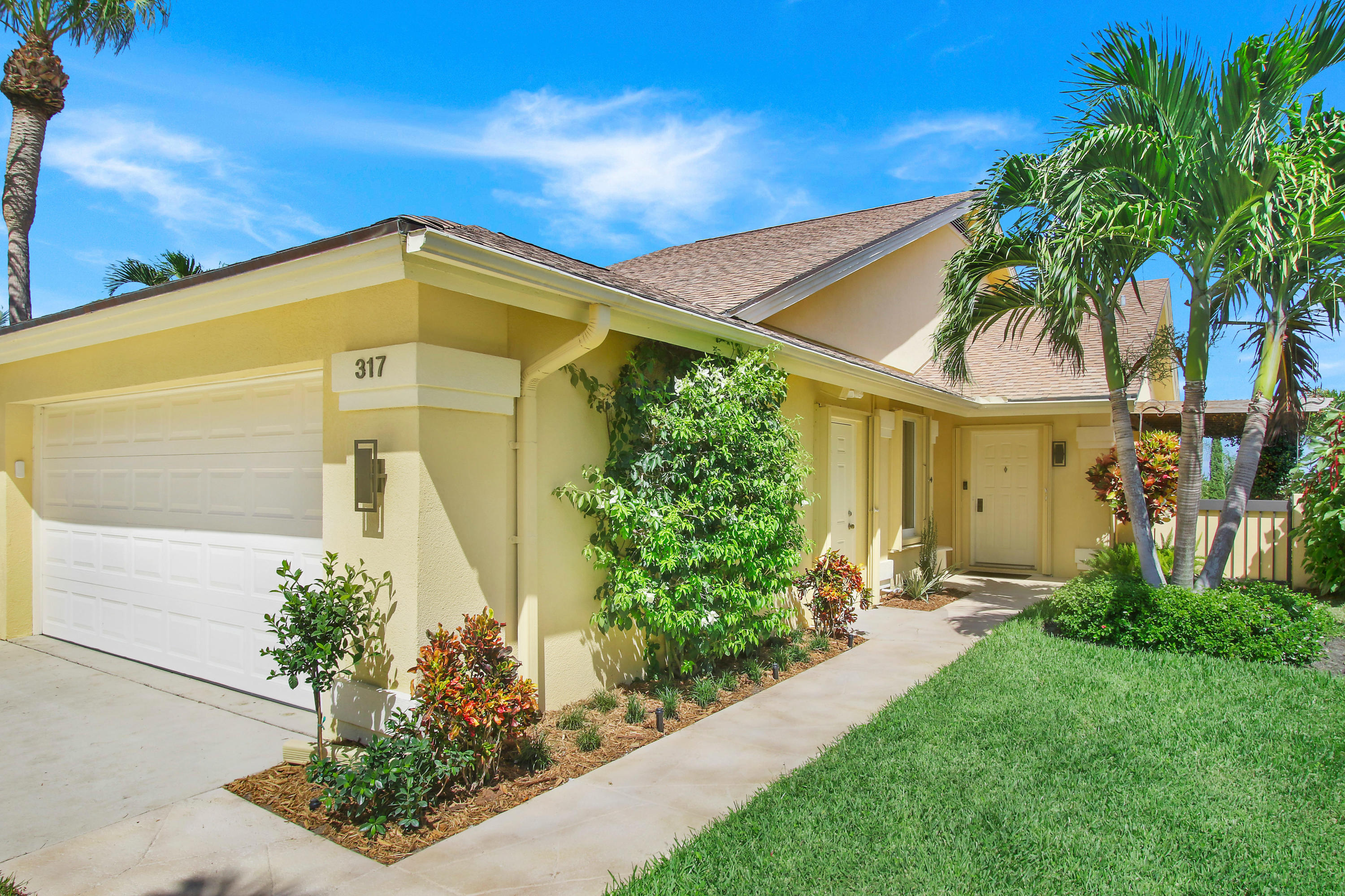 317 Ridge Road Jupiter, FL 33477 - Photo 3 of 33 Path to Front Door