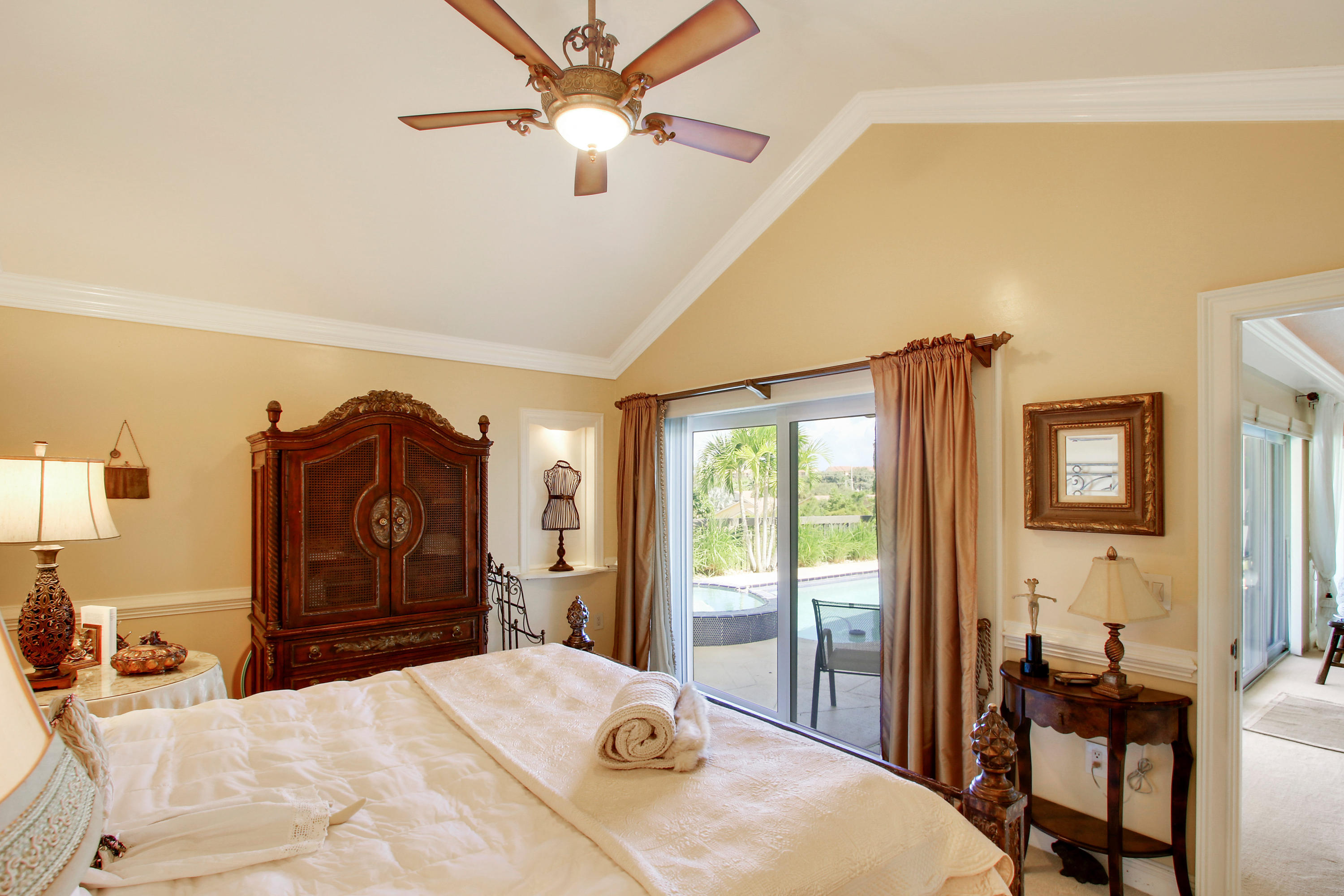 317 Ridge Road Jupiter, FL 33477 - Photo 7 of 33 Master Bedroom overlooking the Pool