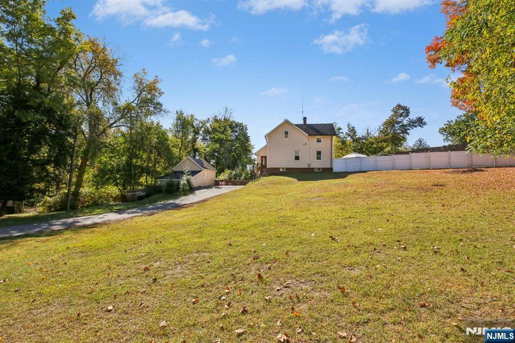 369 Queens Court Ridgewood, NJ 07450 - Photo 36 of 40 a view of a large body of water with an outdoor space