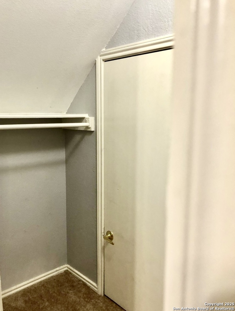 9135 Rue De Lis San Antonio, TX 78250 - Photo 13 of 23 a bathroom with a glass shower door