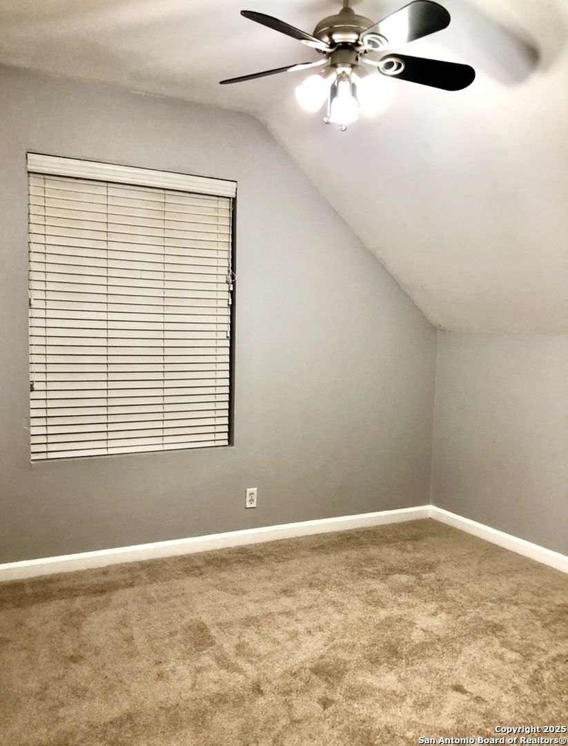 9135 Rue De Lis San Antonio, TX 78250 - Photo 15 of 23 a view of an empty room with a window