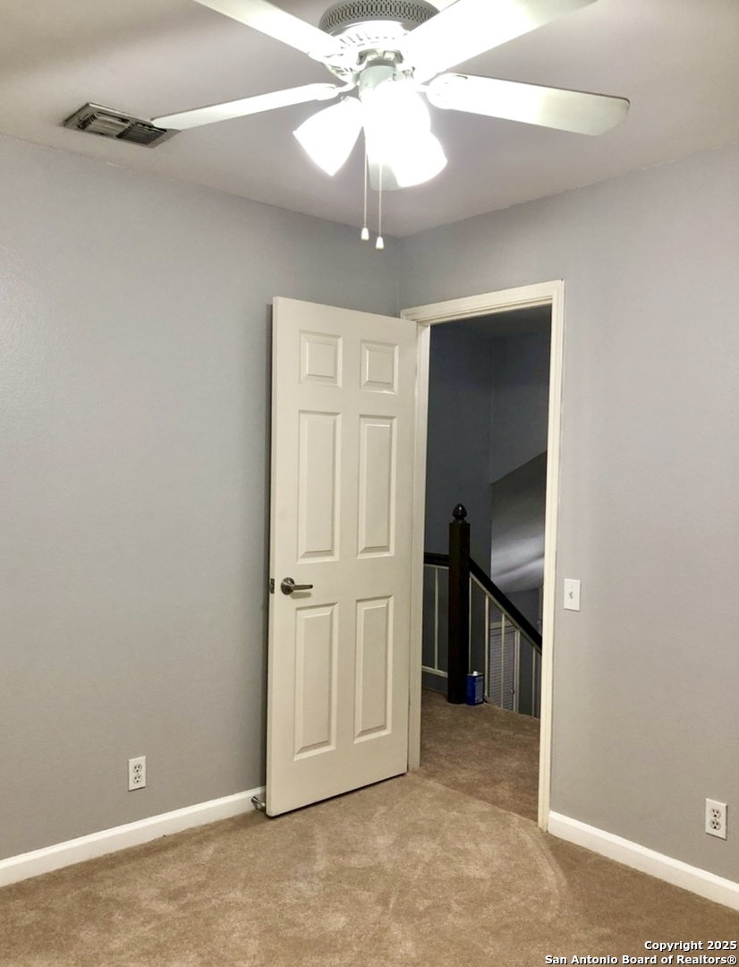 9135 Rue De Lis San Antonio, TX 78250 - Photo 16 of 23 a view of an empty room with a cabinet