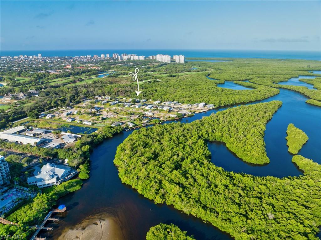 777 Walkerbilt Road, Unit 34 Naples, FL 34110 - Photo 20 of 23 View of the home and Gulf of Mexico
