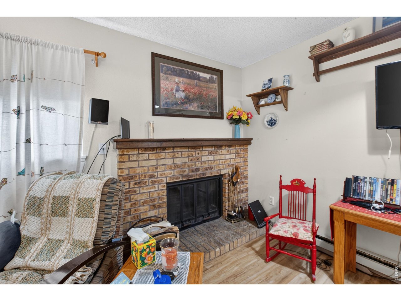 1024 East Swallow Road, Unit 311 Fort Collins, CO 80525 - Photo 14 of 16 Cozy Wood Burning Fireplace