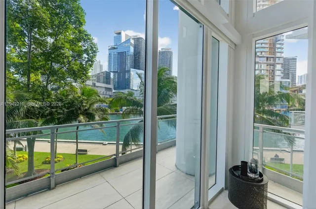 a view of a balcony with chairs