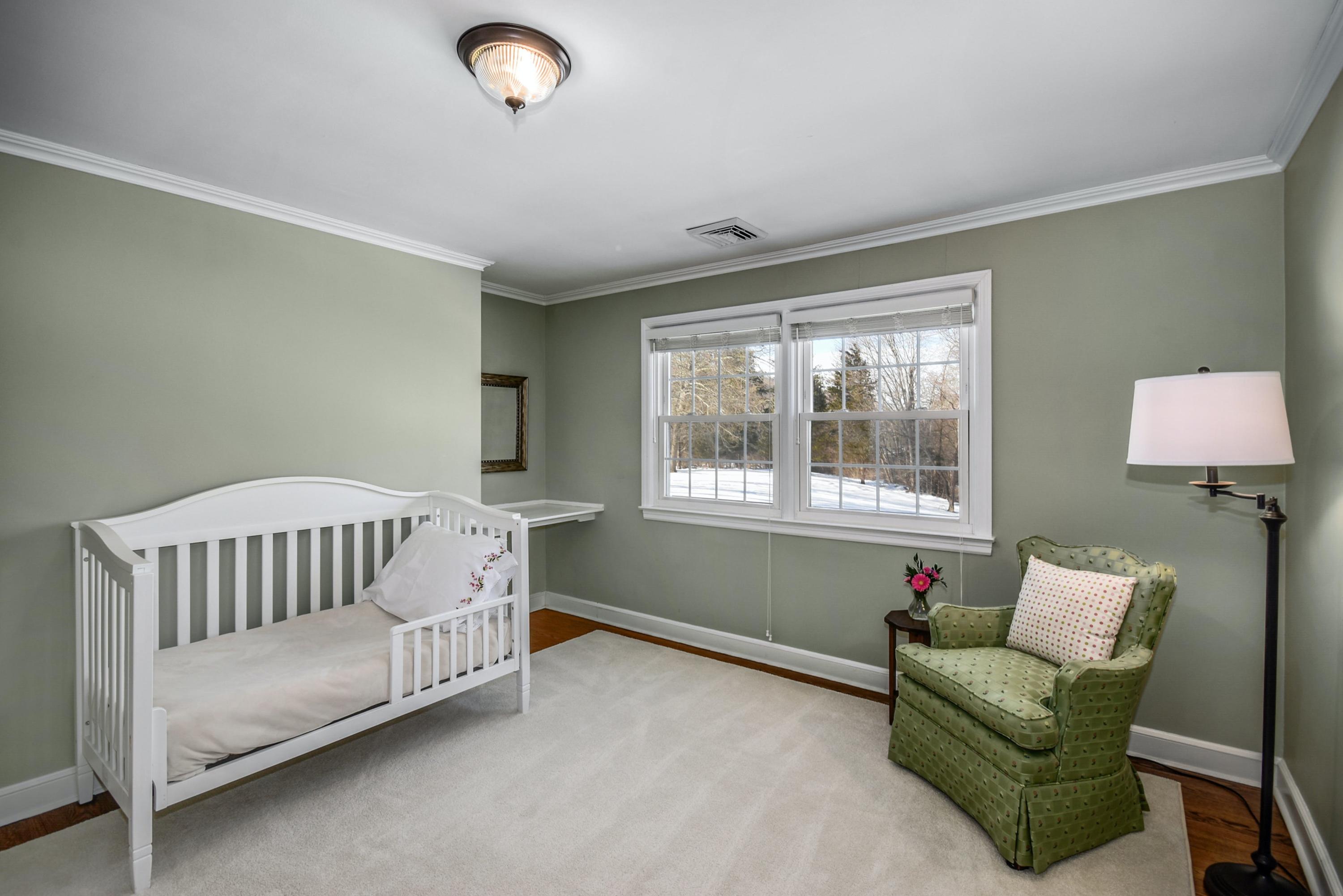 39 Scribner Hill Road Wilton, CT 06897 - Photo 16 of 25 a living room with furniture and a window