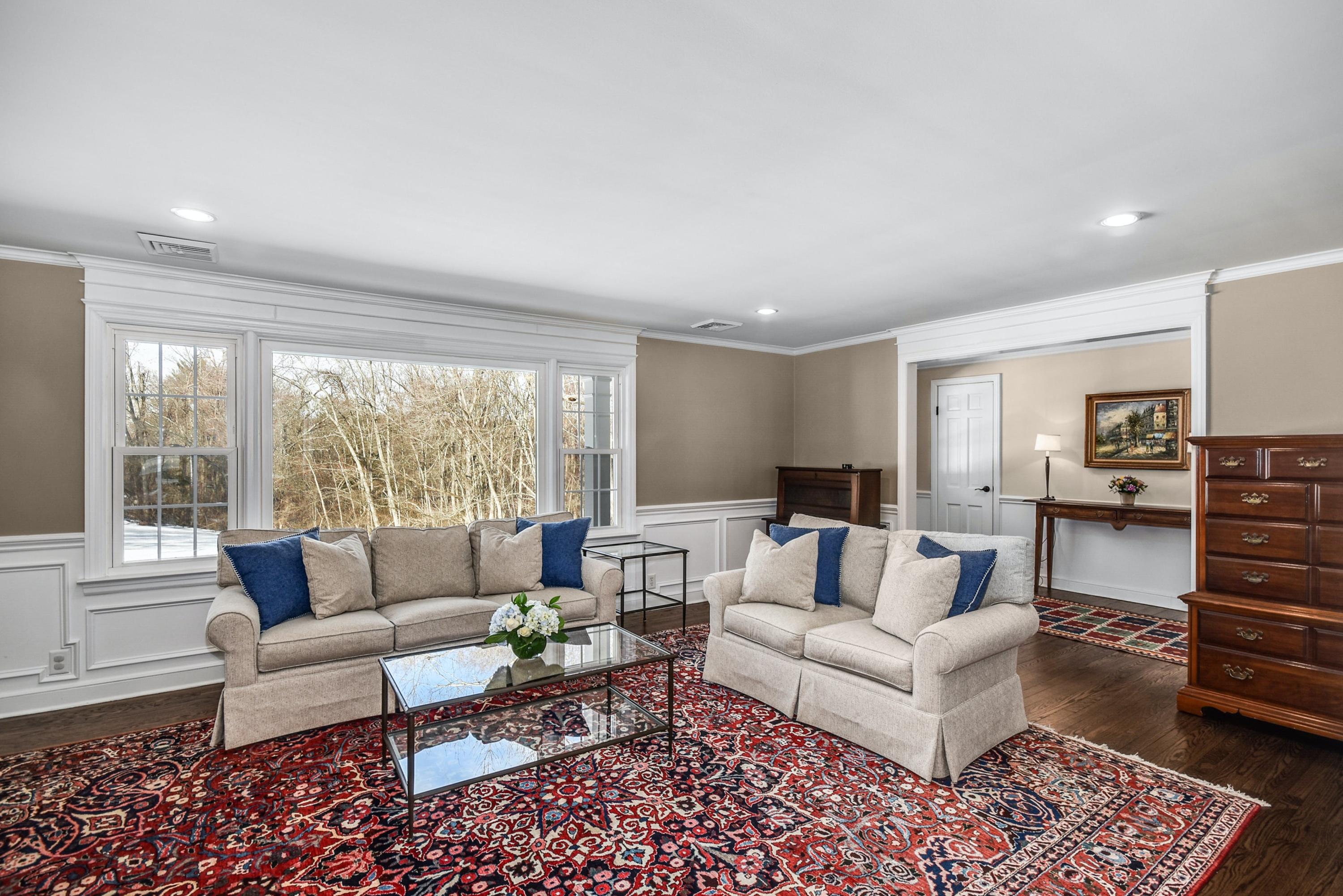 39 Scribner Hill Road Wilton, CT 06897 - Photo 6 of 25 a living room with furniture and a rug