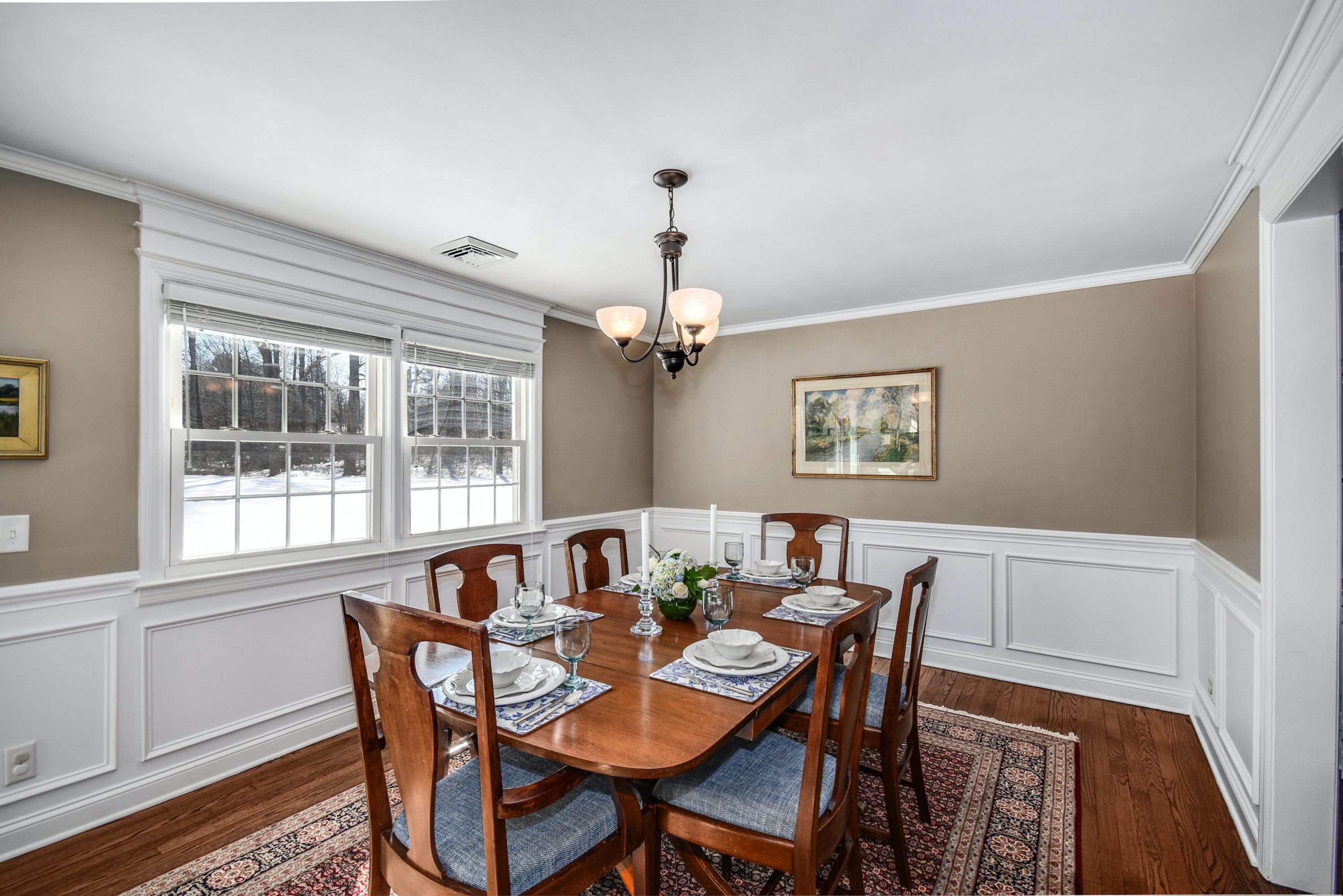 39 Scribner Hill Road Wilton, CT 06897 - Photo 8 of 25 a view of a dining room with furniture window and wooden floor