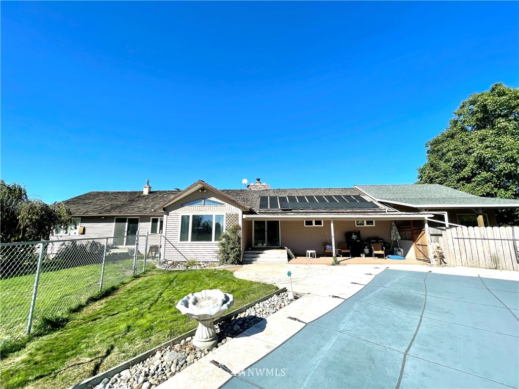 28 Dixon Road Omak, WA 98841 - Photo 2 of 39 a view of a house with backyard porch and furniture