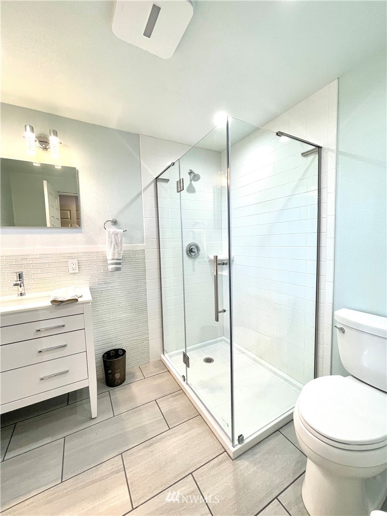 28 Dixon Road Omak, WA 98841 - Photo 21 of 39 a bathroom with a sink toilet and shower