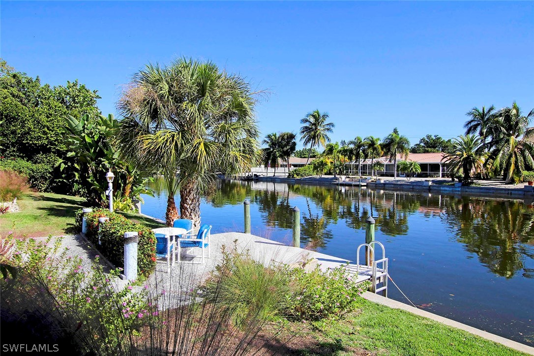 822 Beach Road Sanibel, FL 33957 - Photo 3 of 35 a view of a lake with houses
