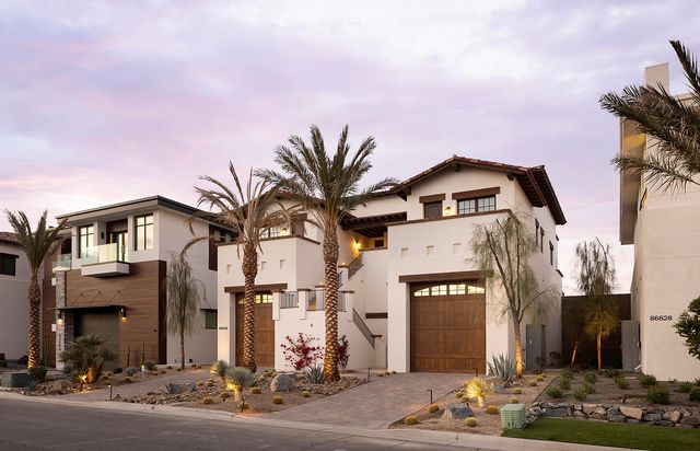 a front view of a building with a street