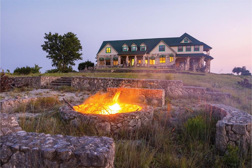 10771 6th Highway Meridian, TX 76665 - Photo 3 of 40 View of swimming pool featuring covered porch and a fire pit