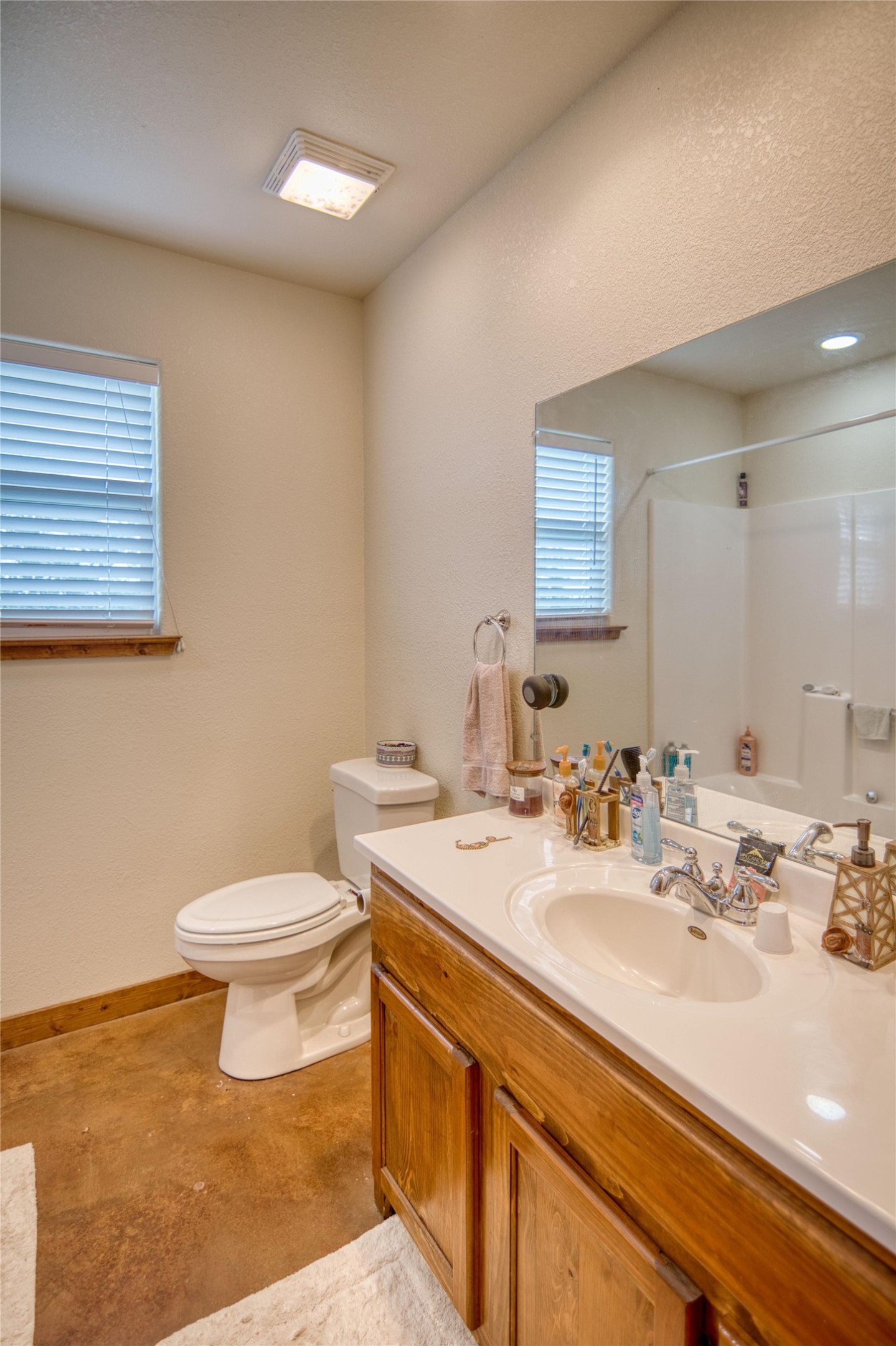 12119 Highway 29 Llano, TX 78643 - Photo 11 of 40 Bathroom with vanity and a shower