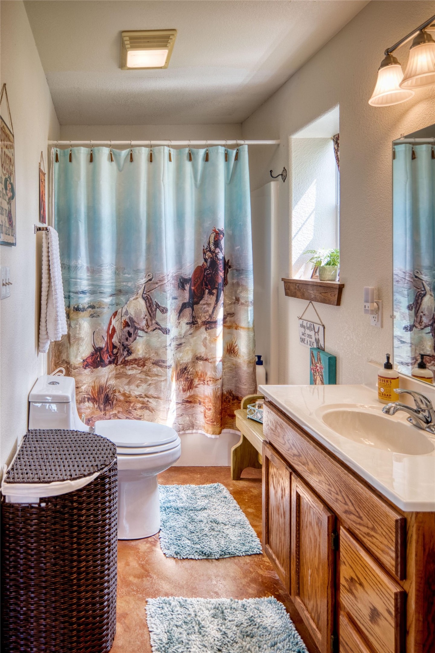 12119 Highway 29 Llano, TX 78643 - Photo 29 of 40 Bathroom with vanity and shower / tub combo with curtain