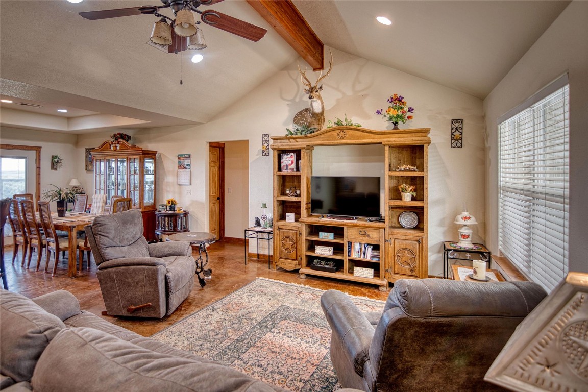 12119 Highway 29 Llano, TX 78643 - Photo 6 of 40 a living room with furniture and a flat screen tv