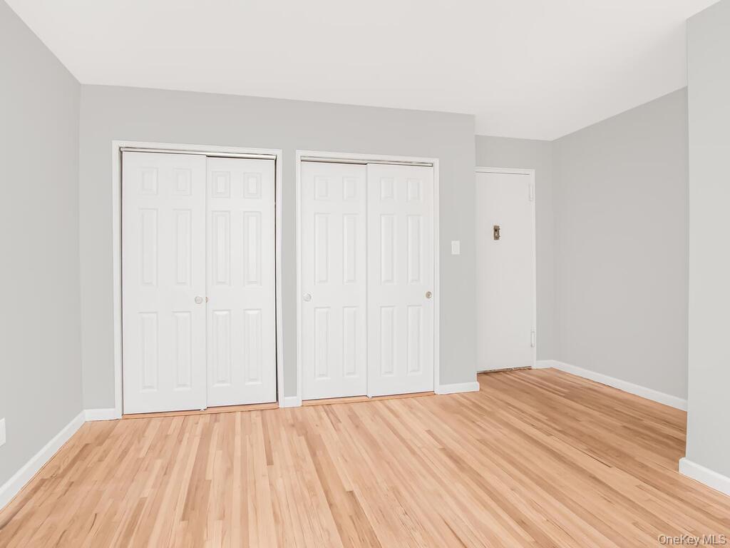 6535 Broadway, Unit 5C Bronx, NY 10471 - Photo 6 of 12 a view of empty room with wooden floor