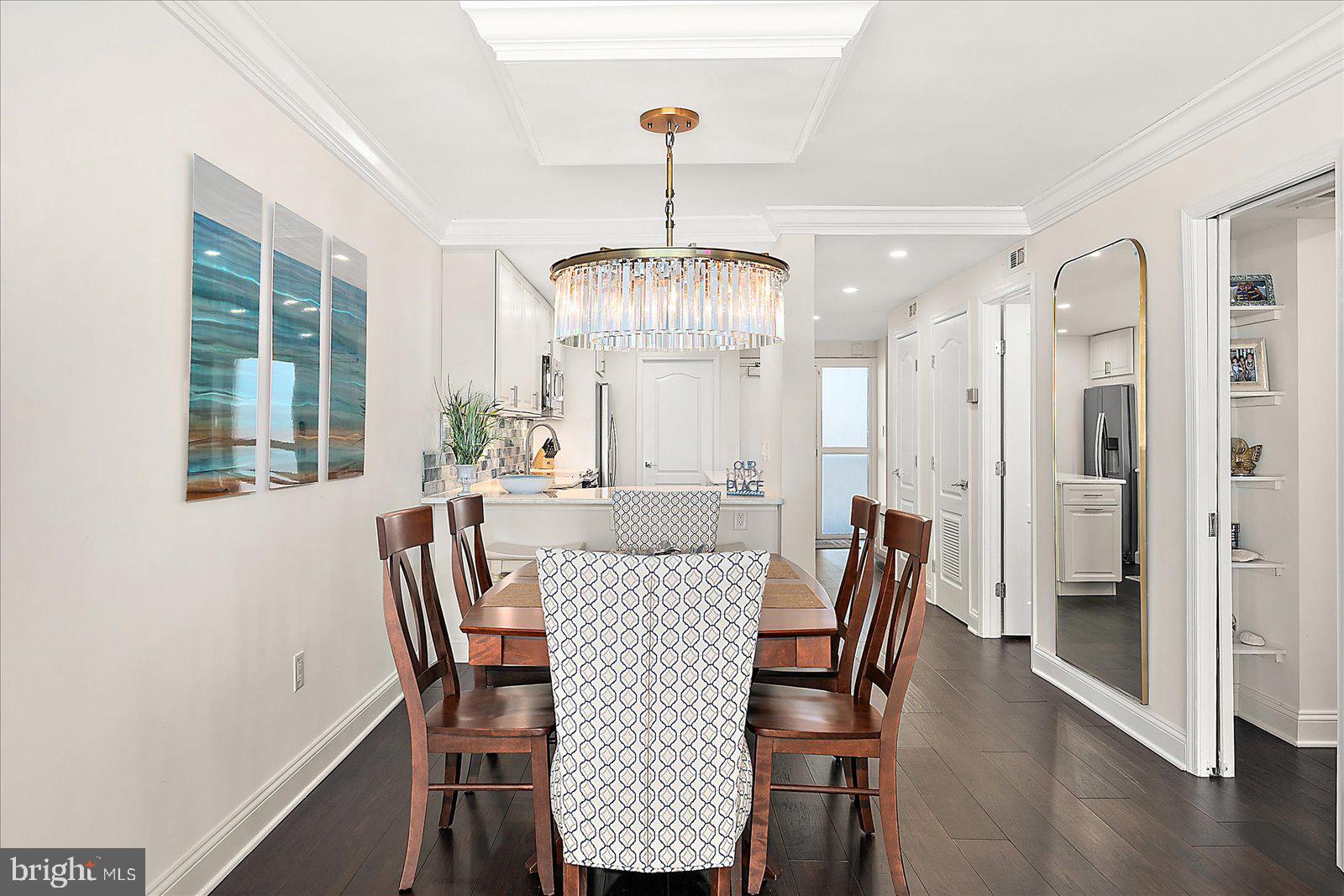903 North Edgewater House Road Bethany Beach, DE 19930 - Photo 17 of 43 a view of a dining room with furniture window and wooden floor
