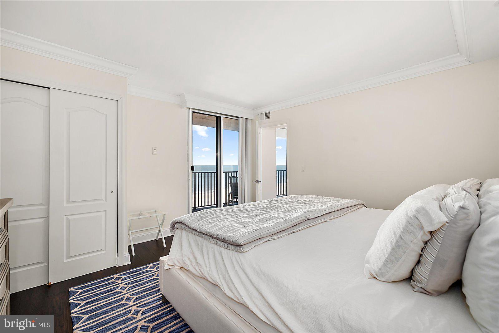 903 North Edgewater House Road Bethany Beach, DE 19930 - Photo 18 of 43 a bedroom with a bed and a window