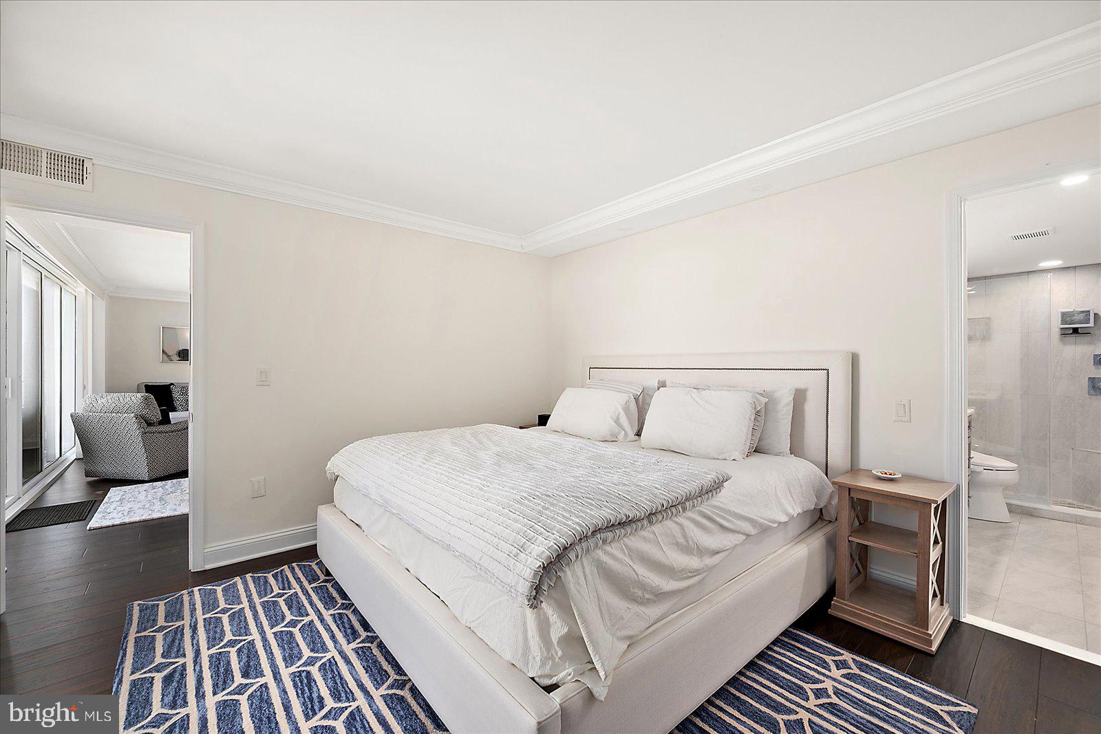 903 North Edgewater House Road Bethany Beach, DE 19930 - Photo 20 of 43 a bedroom with a bed and wooden floor