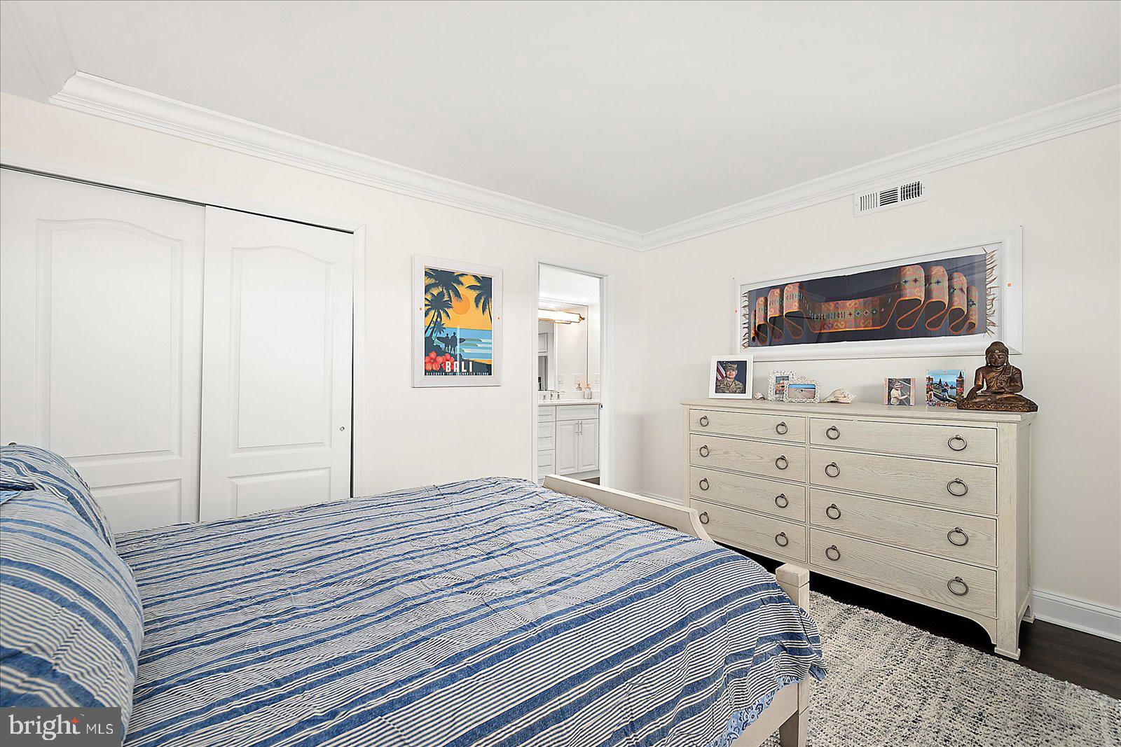 903 North Edgewater House Road Bethany Beach, DE 19930 - Photo 23 of 43 a bedroom with a bed and a flat screen tv