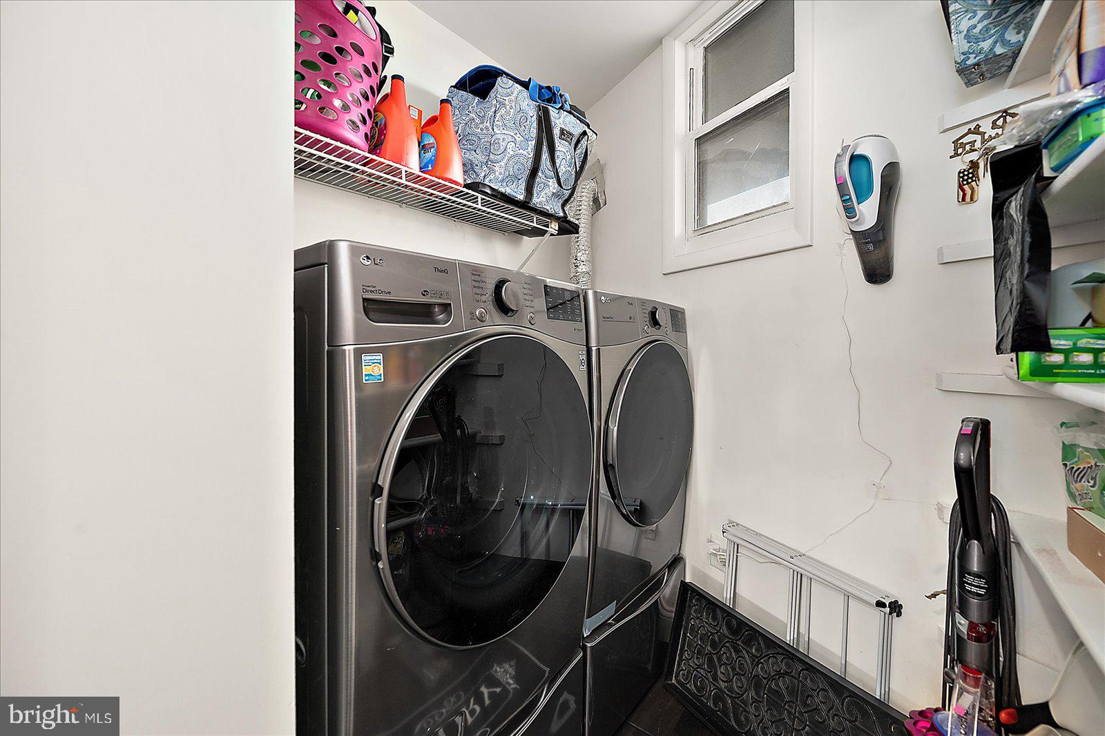 903 North Edgewater House Road Bethany Beach, DE 19930 - Photo 28 of 43 a utility room with dryer and washer