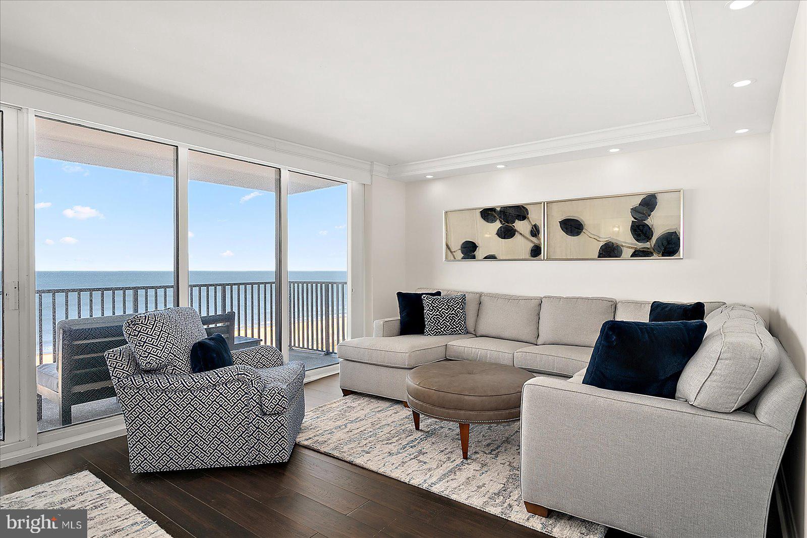 903 North Edgewater House Road Bethany Beach, DE 19930 - Photo 3 of 43 a living room with furniture and a large window