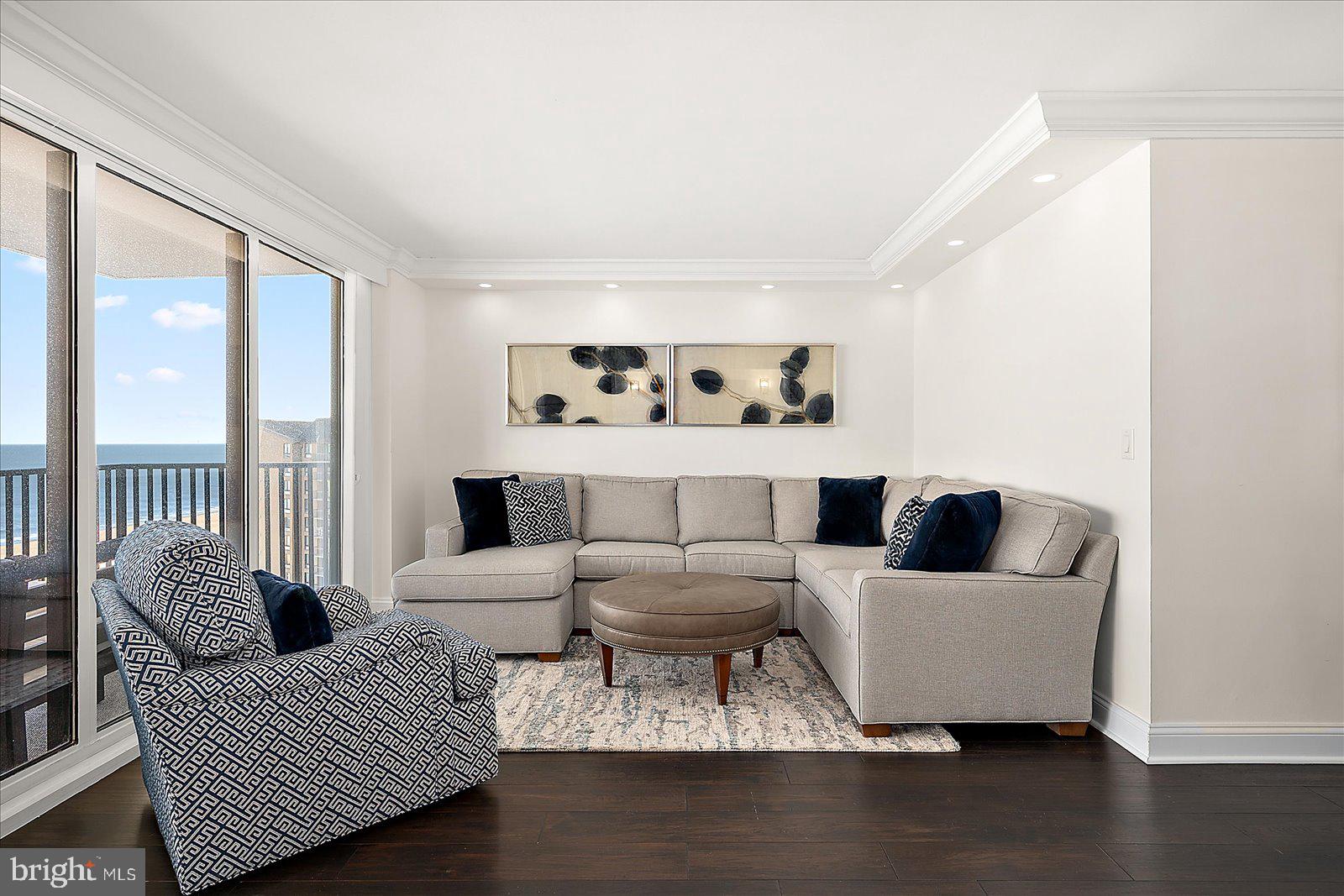 903 North Edgewater House Road Bethany Beach, DE 19930 - Photo 8 of 43 a living room with furniture and a large window