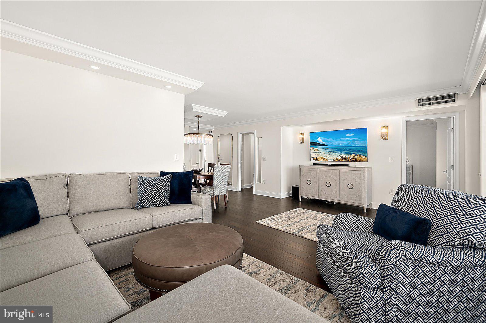 903 North Edgewater House Road Bethany Beach, DE 19930 - Photo 9 of 43 a living room with furniture and a flat screen tv