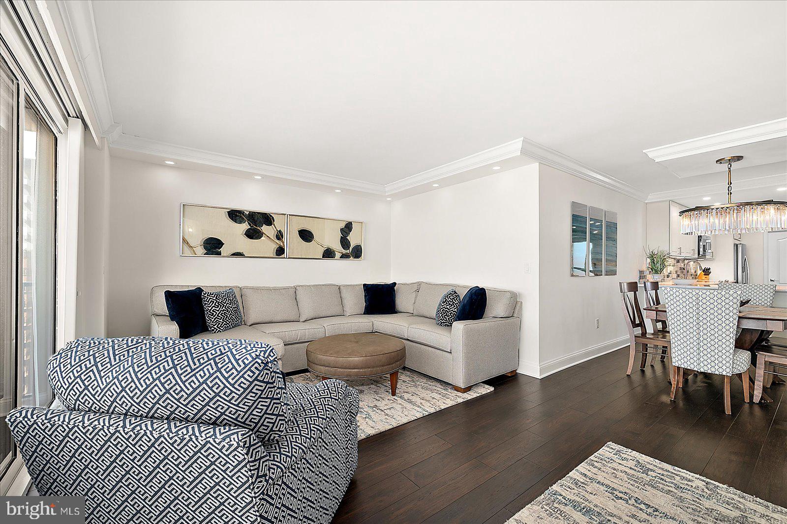 903 North Edgewater House Road Bethany Beach, DE 19930 - Photo 10 of 43 a living room with furniture and a wooden floor