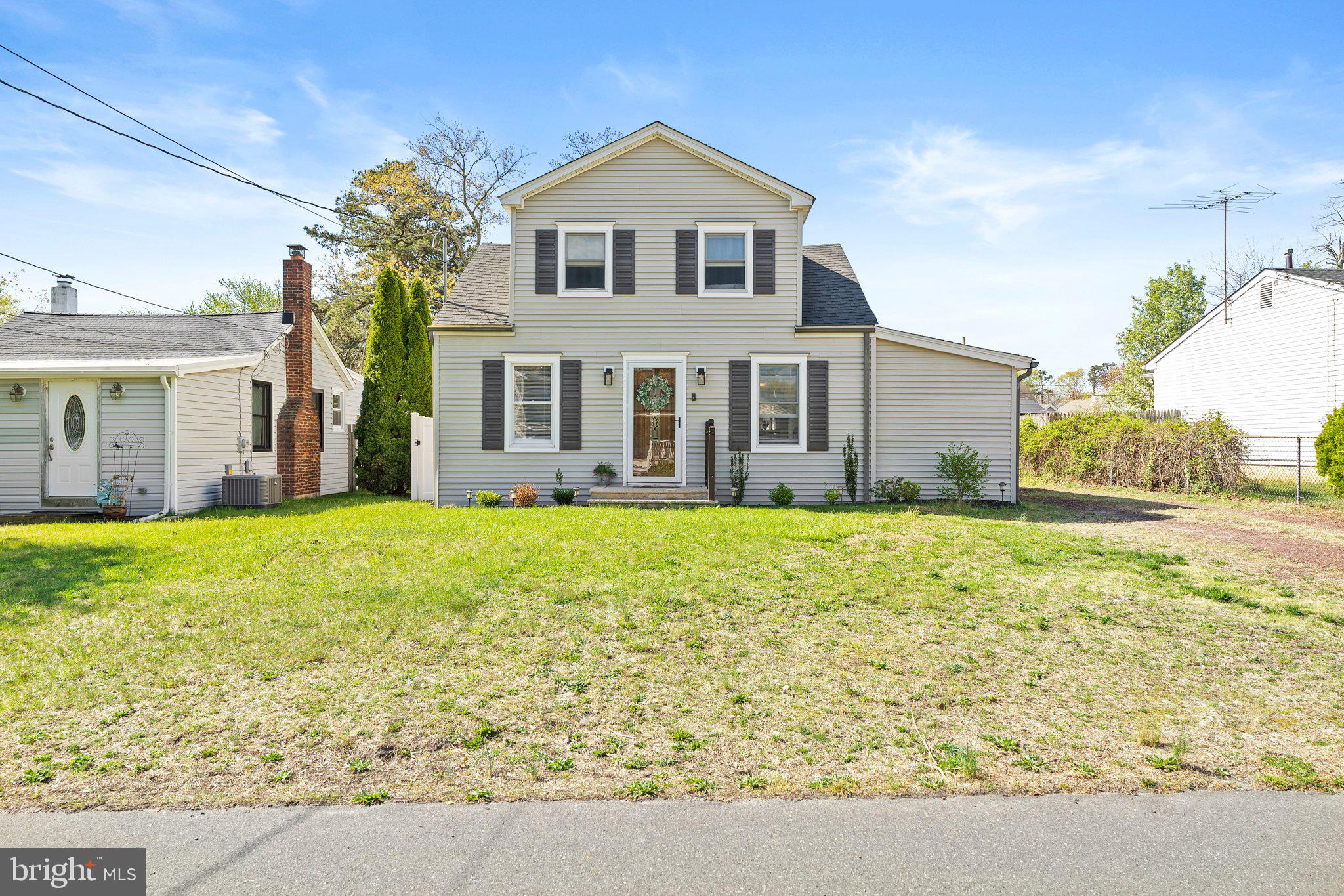 831 Conte Avenue Brick, NJ 08724 - Photo 1 of 27 a front view of a house with garden