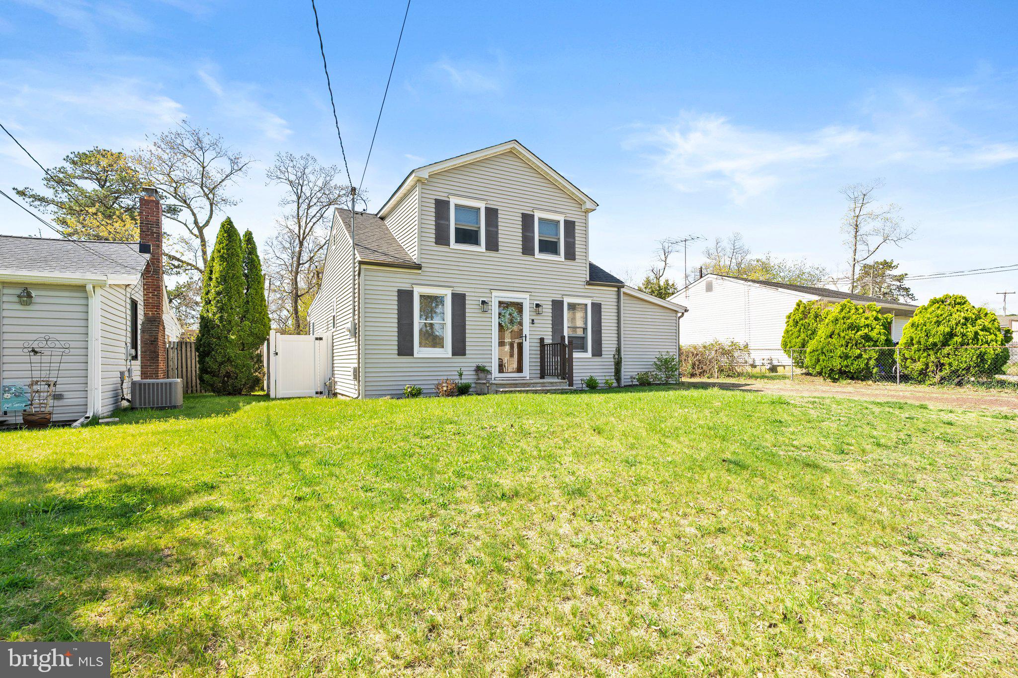 831 Conte Avenue Brick, NJ 08724 - Photo 2 of 27 a front view of a house with a yard