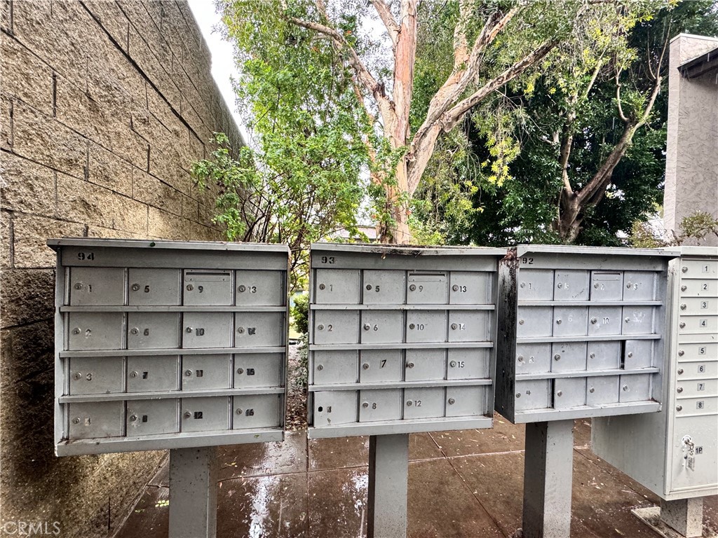 346 Miraleste Drive, Unit 301 San Pedro, CA 90732 - Photo 16 of 22 a view of a house with a large tree