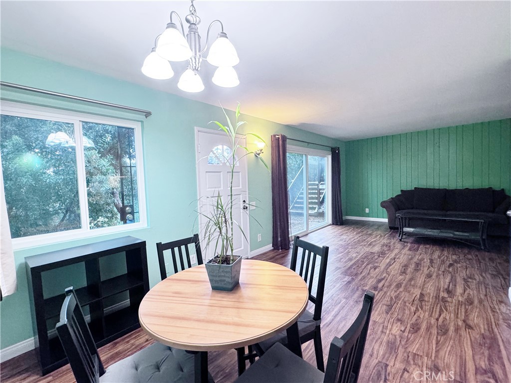 346 Miraleste Drive, Unit 301 San Pedro, CA 90732 - Photo 4 of 22 a view of a dining room with furniture window and wooden floor
