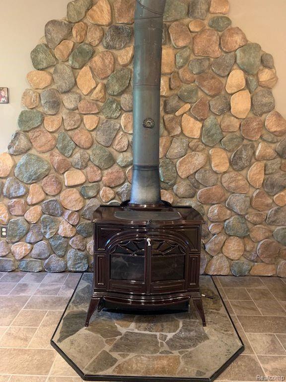 2283 East Dayton Road Caro, MI 48723 - Photo 10 of 30 wood burning stove