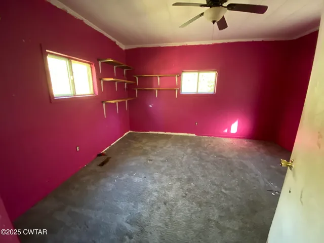 an empty room with windows