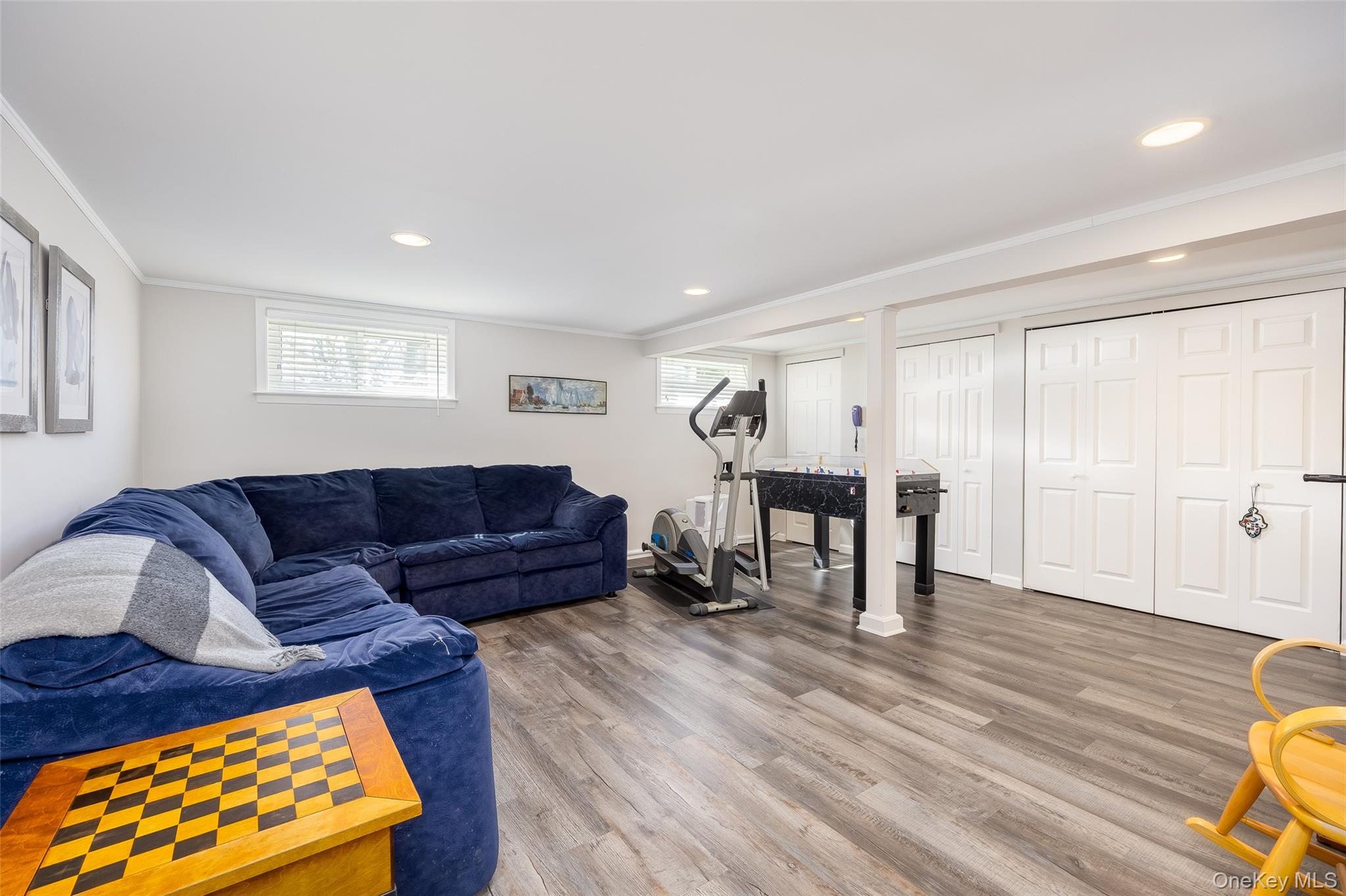 4 Knoll Top Road Stony Brook, NY 11790 - Photo 20 of 40 Alternate view of rec room with recessed lighting, windows and closets