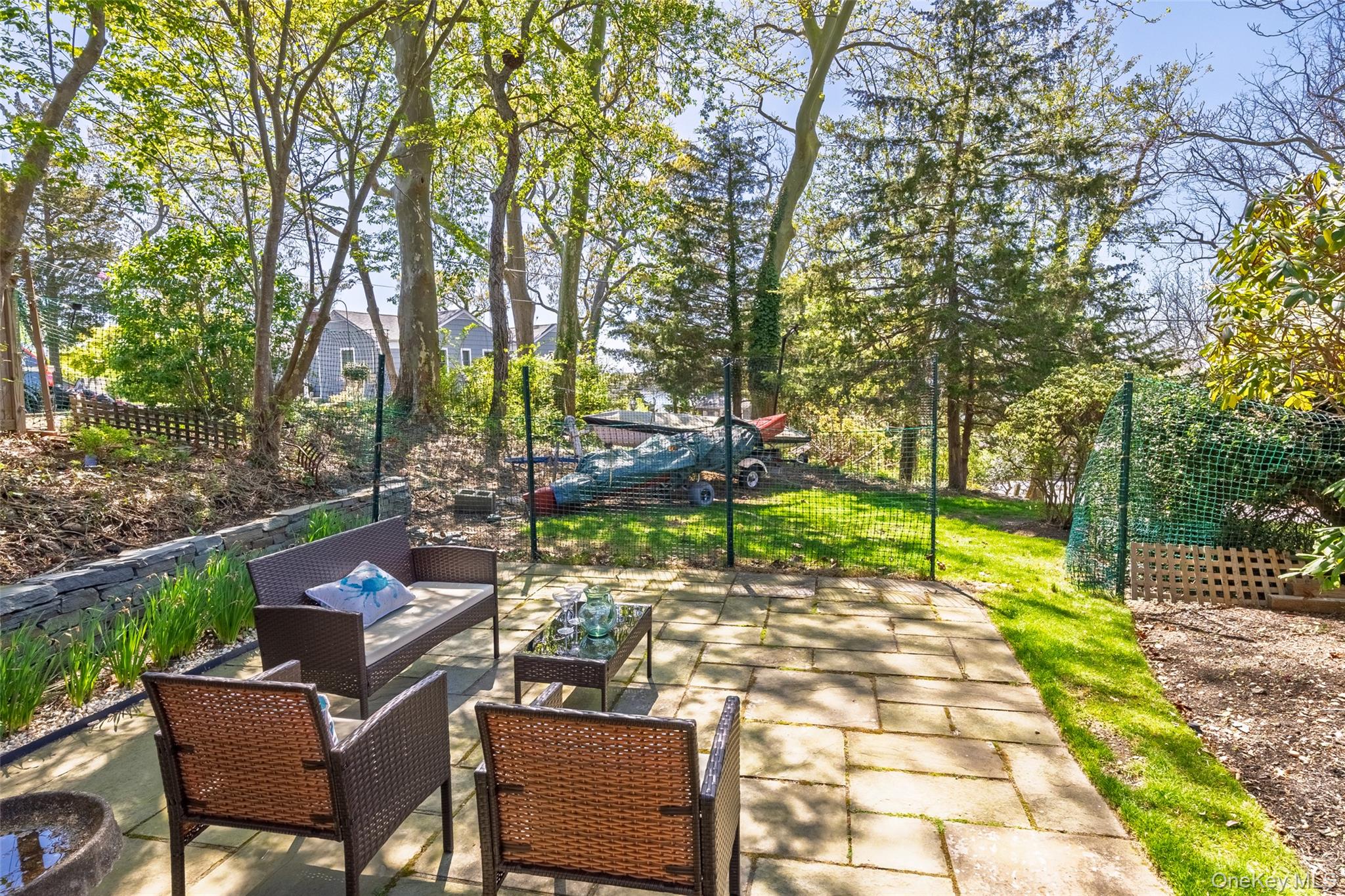 4 Knoll Top Road Stony Brook, NY 11790 - Photo 27 of 40 Rear stone patio