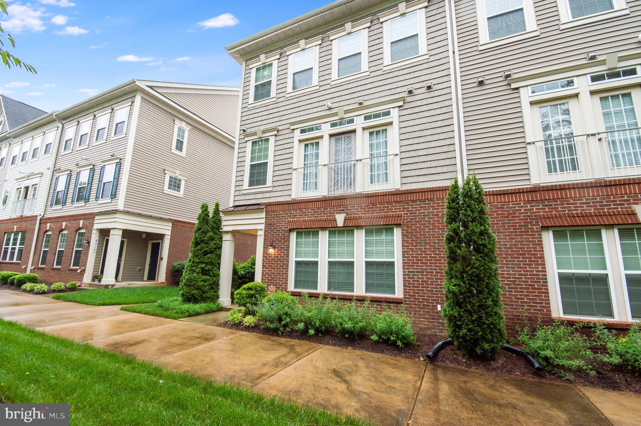 4722 Dane Ridge Circle Woodbridge, VA 22193 - Photo 3 of 28 a view of a building with a yard