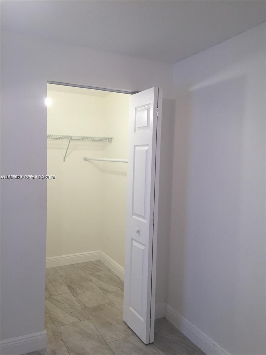 777 Southwest 9th Avenue, Unit 411 Miami, FL 33130 - Photo 6 of 14 a view of an empty room