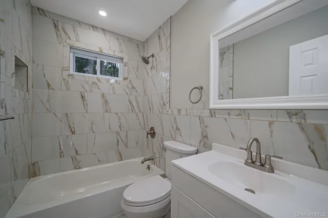 a view of an empty room with a garage