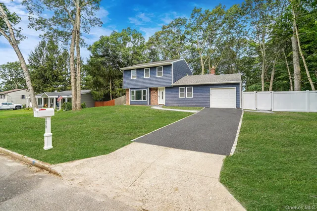 a brick house with a yard