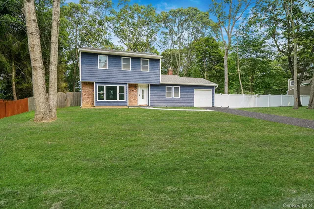 a aerial view of a golf course with an ocean