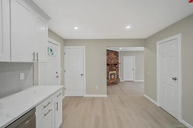 a view of kitchen with wooden floor